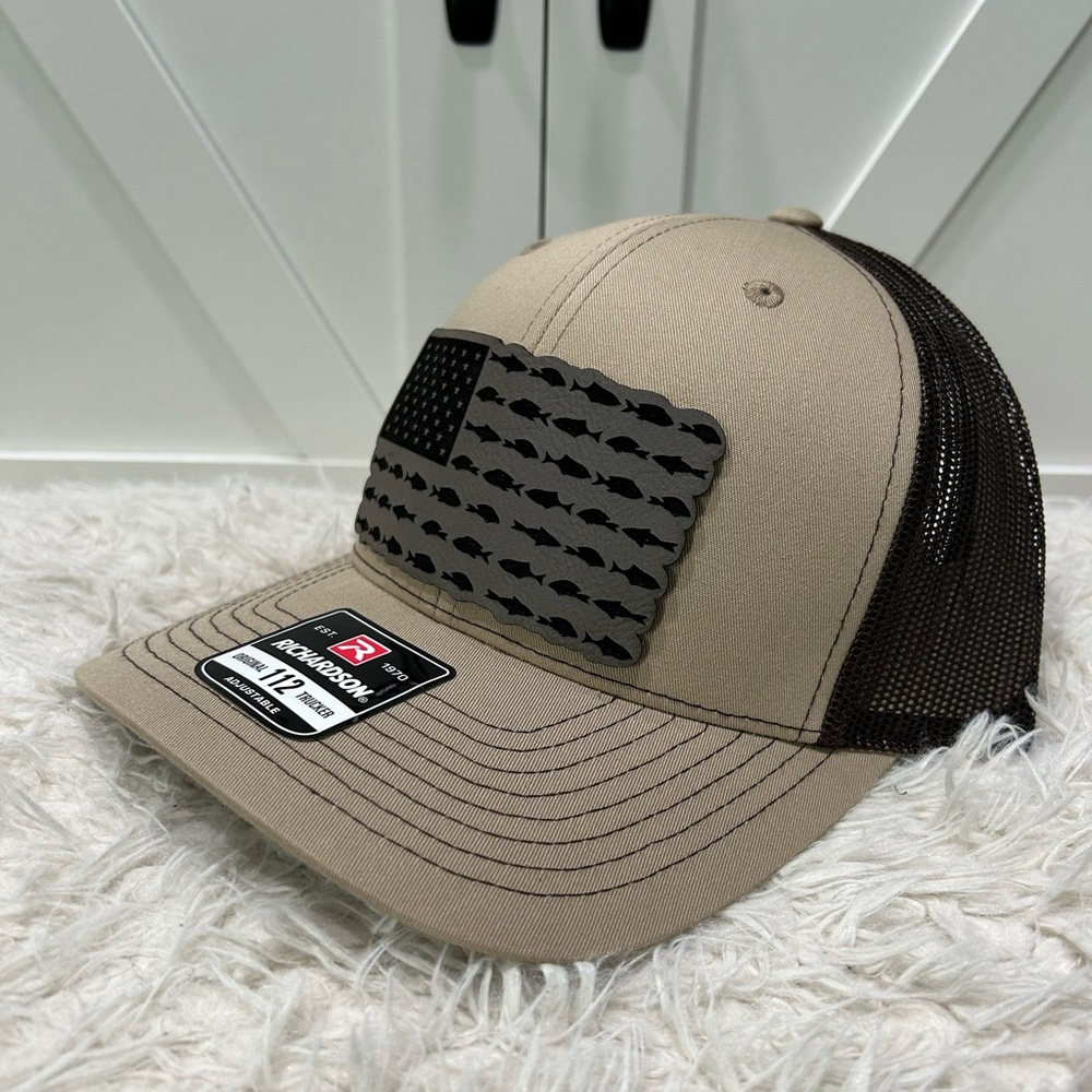 Laser engraved American flag fish. Richardson 112 trucker hat.